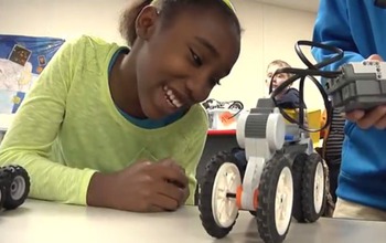 Student with robot